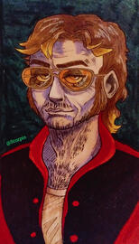 A stubbled man with a blond-tipped mullet, wearing a black and red windbreaker.